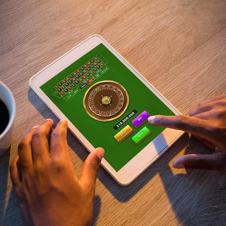 Mobile phone showing Aviator betting interface and multiplier prediction on dewa33 slot